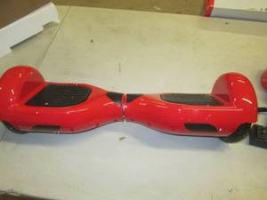 red hoverboard powers on ...