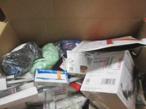 box of pens,paperclips,paper and lo...