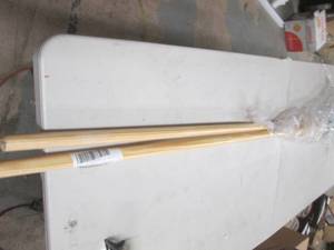 2 mops with wooden hanndles ...