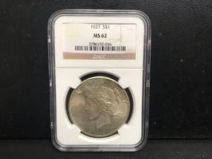 lot 9 image: 1927 P Peace Dollar MS62