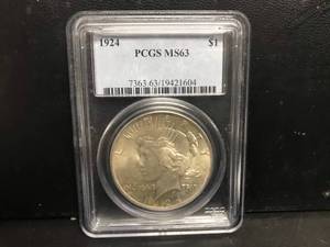 lot 12 image: 1924 P Peace Dollar MS 63