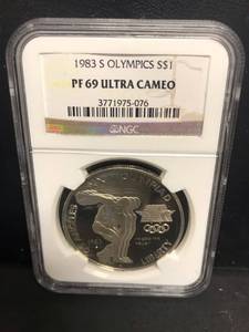 lot 21 image: 1983 S Olympics PF69 Ultra Cameo Coin