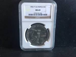 lot 114 image: 1983 P Olympics MS69 Coin