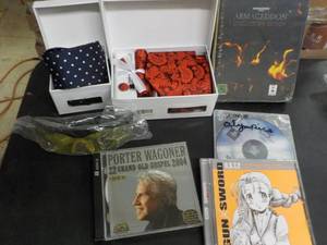 lot 24 image: Ties, Sunglasses, CDs and DVDs...