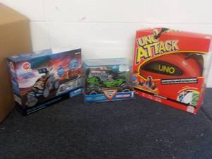 lot 70 image: Solar Robot, Monster Jam, and Uno A...
