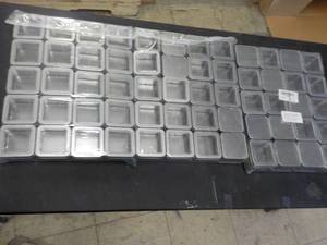 lot 172 image: Prangada Empty 4 oz Metal and Plast...