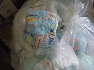 lot 245 image: 100 or so Diapers newborn 3 month ...