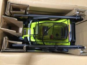 Ryobi 13 in. ONE 18-Volt Lithium-Ion Cordless Battery Walk Behind Push Lawn Mower - 4.0 Ah Battery & Charger Included in good condition