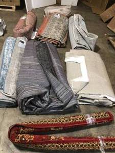 Lot of assorted Area Rugs and others not used see pictures