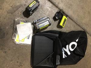 Ryobi 20 in. 40-Volt Brushless Lithium-Ion Cordless Battery Walk Behind Push Lawn Mower 6.0 Ah BatteryCharger Included not used see pictures
