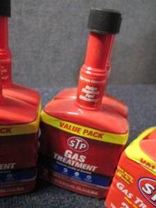 8- 12 oz Bottles STP Gas Treatment...