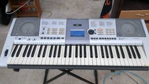 lot 31 image: Yamaha Keyboard with Stand Model # PSR-E403
