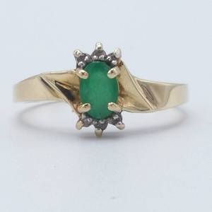 lot 2 image: Eye-Catching Oval Emerald & Diamond Ring in 10K yellow Gold