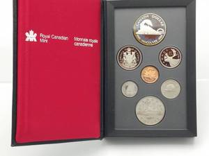 lot 37 image: 1986 Canada 7 Coin Prestige Silver Dollar PROOF Set - DEEP CAMEO