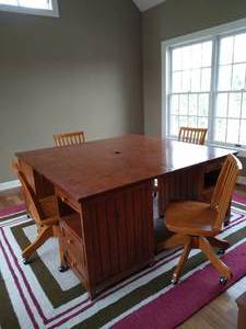 Large Table with Four Chairs and Rug