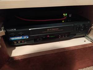 VHS Player, DVD Player And DVDS