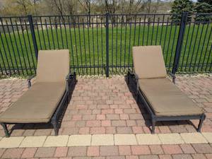 Two Metal Lounge Chairs