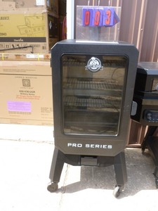 Pit Boss Pellet smoker. Appears lightly used. Control panel shows working. As shown.