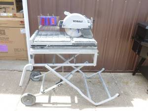 Kobalt tile saw. Tested & works. Cords have been cut & will need to be re-wired. As shown.