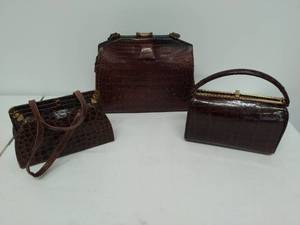 lot 12 image: Three Leather Handbags