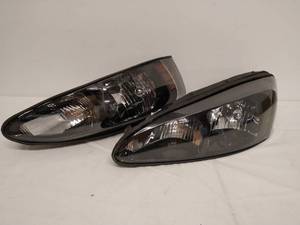 lot 214 image: Pair Of Headlights