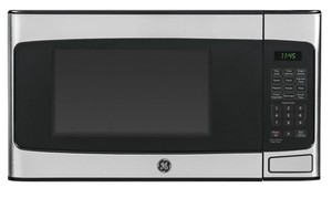 lot 606 image: GE - 1.1 Cu. Ft. Mid-Size Microwave - Stainless steel