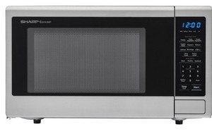 lot 607 image: Sharp - Carousel 1.1 Cu. Ft. Mid-Size Microwave - Stainless steel