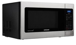 lot 609 image: Samsung 1.1 cu. ft Countertop Microwave with Grilling Element in Stainless Steel