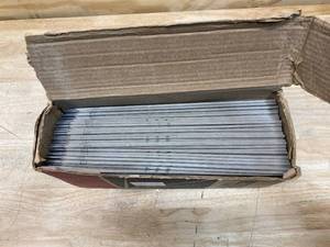 lot 31 image: LINCOLN ELECTRIC 14 in Carbon Steel Can Stick Electrode with 18 in Dia. and E6013 AWS Classification.  Retails for $208.08