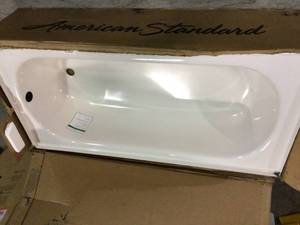 Salem 60 in. Right Hand Drain Rectangular Apron Front Bathtub in White by American Standard corner damaged not used Customer Returns See Pictures