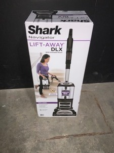 lot 16 image: SHARK NAVIGATOR LIFT-AWAY DLX VACUUM CLEANER. SEE PICTURES