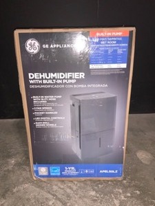 lot 21 image: GE 50 PT. DEHUMIDIFIER FOR WET ROOMS UP TO 1500 SQ. FT. WITH BUILT-IN-PUMP IN GREY, ENERGY STAR. SEE PICTURES