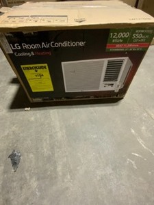 lot 35 image: LG ELECTRONICS 12,000 BTU 230208-VOLT WINDOW AIR CONDITIONER WITH COOL, HEAT AND REMOTE IN WHITE. SEE PICTURES