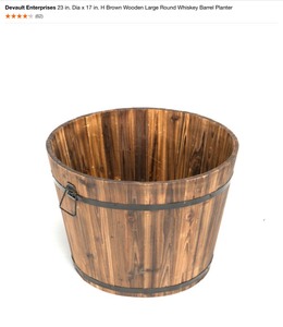 lot 42 image: DEVAULT ENTERPRISES 23 IN. DIA X 17 IN. H BROWN WOODEN LARGE ROUND WHISKEY BARREL PLANTER. SEE PICTURES