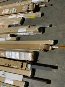 lot 79 image: ASSORTED WOODLAMINATE MOLDINGS PLUS MORE VARIOUS KINDS AND CONDITIONS. SEE PICTURES