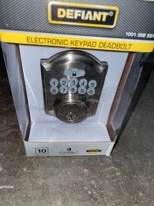 DEFIANT CASTLE SATIN NICKEL ELECTRONIC KEYPAD DEADBOLT. SEE PICTURES