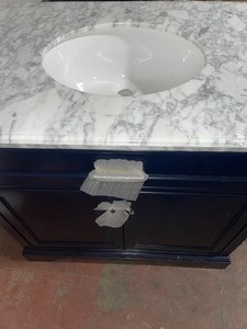 HOME DECORATORS COLLECTION WINDLOWE 37 IN. W X 22 IN. D X 35 IN. H BATH VANITY IN NAVY BLUE WITH CARRARA MARBLE VANITY TOP IN WHITE WITH WHITE SINK. SEE PICTURES