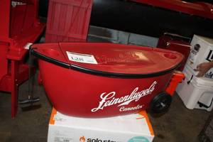 lot 128 image: Leinenkugels Canooler Plastic Rolling Chest Cooler 36Lx16Wx13-12H