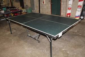 lot 19 image: Stiga Ping Pong Table on wheels 110Lx60Wx26H