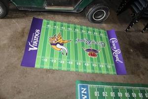 lot 194 image: Crown Royal Minnesota Vikings Football Field Mat 59Lx35-12W