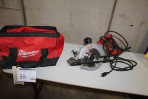 lot 55 image: Milwaukee Worm Drive Circular Saw  7-14  with Tool Bag