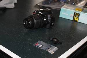 lot 43 image: Nikon 7.49V Cordless Digital SLR Camera D3200  with Lens