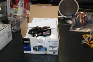 lot 46 image: Sony Handycam Wide LCD Camera HDR-CX190 (in box)  with Camera Accessories