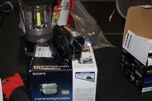 lot 45 image: Sony Handycam Wide LCD Camera DCR-DVD650 (in box)  with Camera Accessories