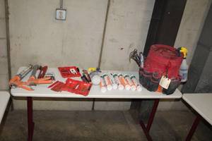 lot 93 image: Bucket Caddy  with Hand Tools and Supplies - Hammers, Screwdrivers, Silicone Caulk Cartridges, Caulk Guns, Bit Set, Misc. Hand Tools