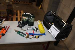 lot 73 image: Tool Caddy 17Lx9Wx10H  with Hand Tools - Wire Cutter, Pry Bar, Coleman Propane Bottle 2-pack, Torch Head, Misc. Hand Tools