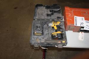 lot 76 image: DeWalt 14.4V Cordless Heavy Duty Impact Wrench DW054  with Battery, Charger, Case