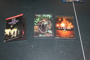 lot 258 image: Lot of (3) DVD Movies  with The Exorcist, Python, Signs