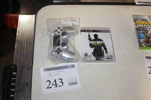 lot 243 image: Lot of (2) Gaming Accessories  with PS4 Controller, PS3 Game Call of Duty
