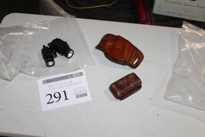 lot 291 image: Lot of (4) Gun Accessories  with Leather Gun Holster, Leather Gun Clip Holster, Light Attachments (x2)
